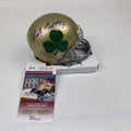 Autographed/Signed Rudy Ruettiger Shamrock Notre Dame Irish Football Mini Helmet JSA COA