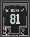 Framed Autographed/Signed Tim Brown 35x39 Oakland Black Football Jersey JSA COA Holo Only