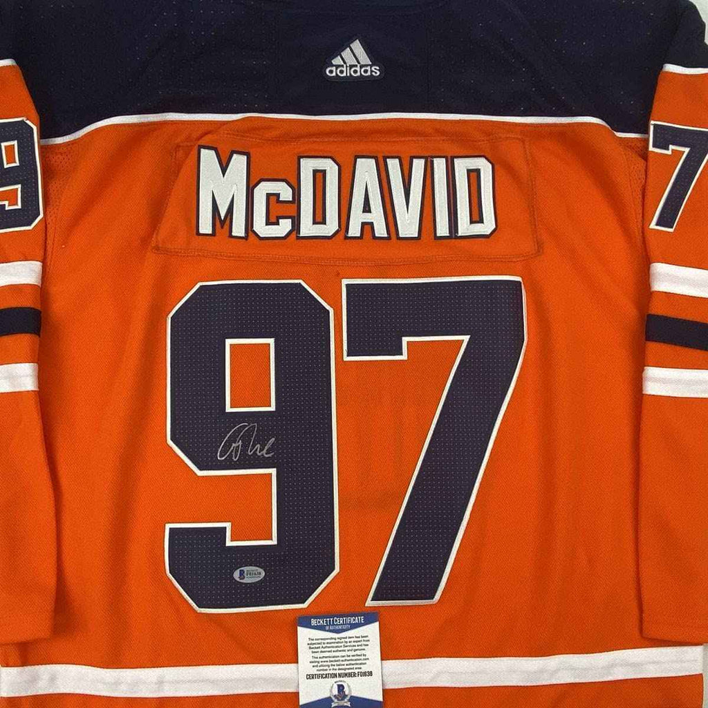 Autographed/Signed Connor McDavid Edmonton Orange Hockey Jersey Beckett BAS COA