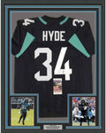 Framed Autographed/Signed Carlos Hyde 35x39 Jacksonville Black Football Jersey JSA COA