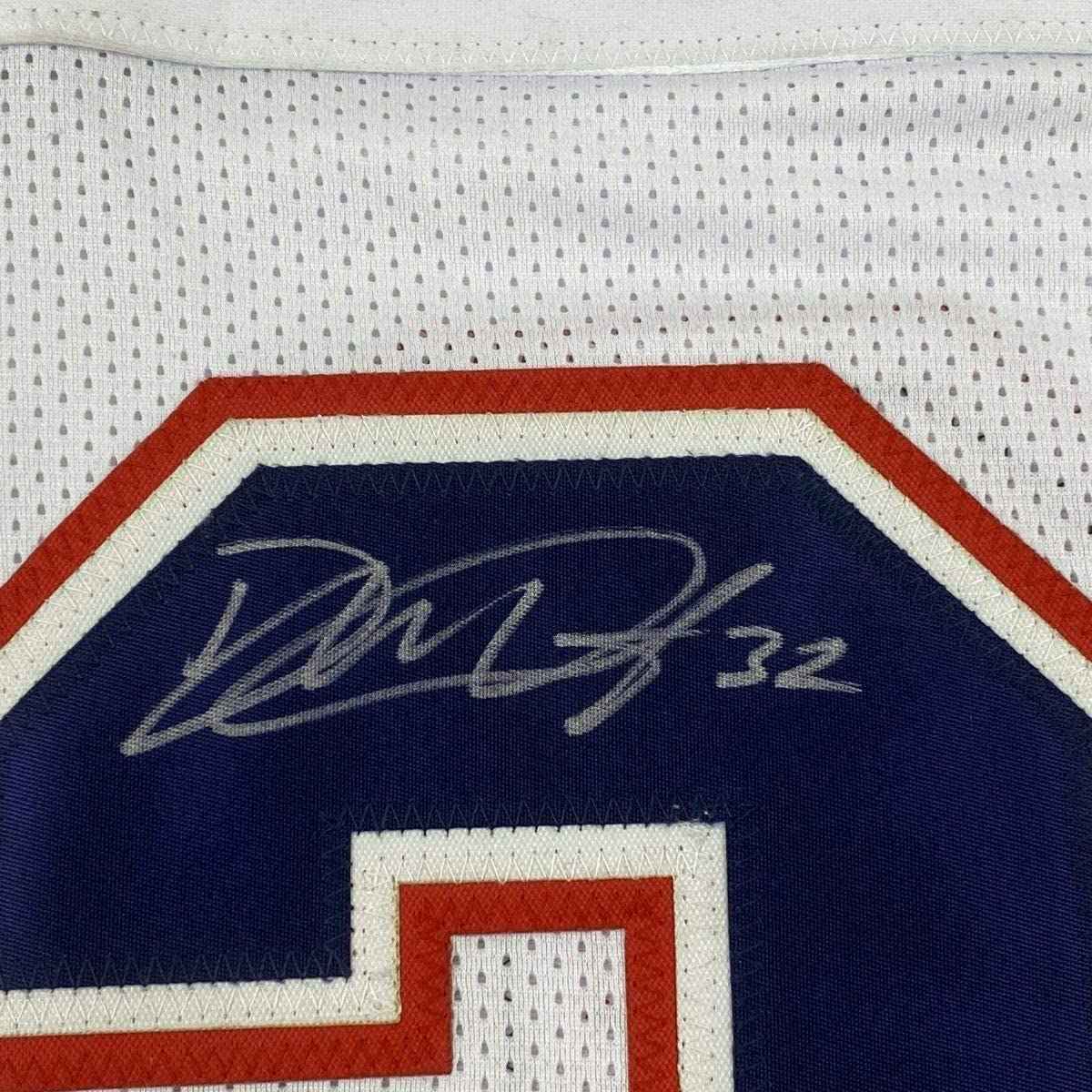 Framed Autographed/Signed Devin McCourty 35x39 New England White Football Jersey JSA COA