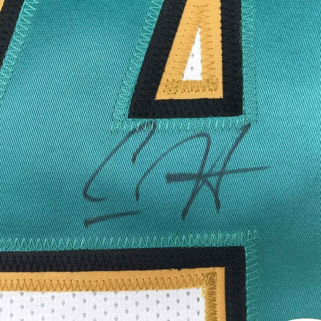 Framed Autographed/Signed Carlos Hyde 35x39 Jacksonville White Football Jersey JSA COA