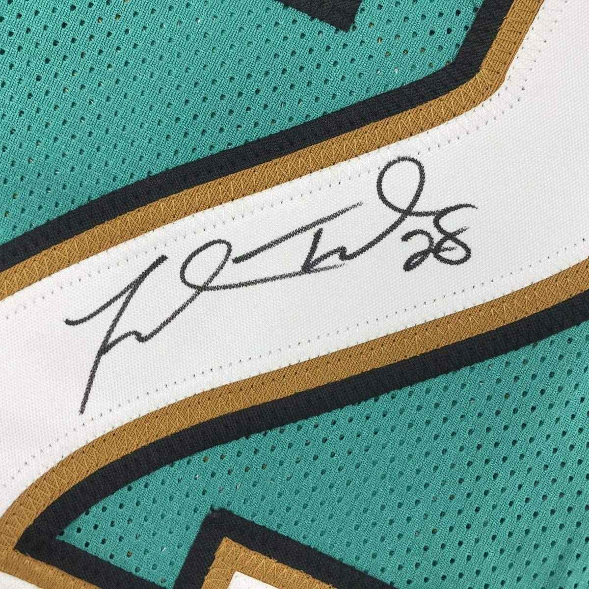 Framed Autographed/Signed Fred Taylor 35x39 Jacksonville Teal Football Jersey JSA COA