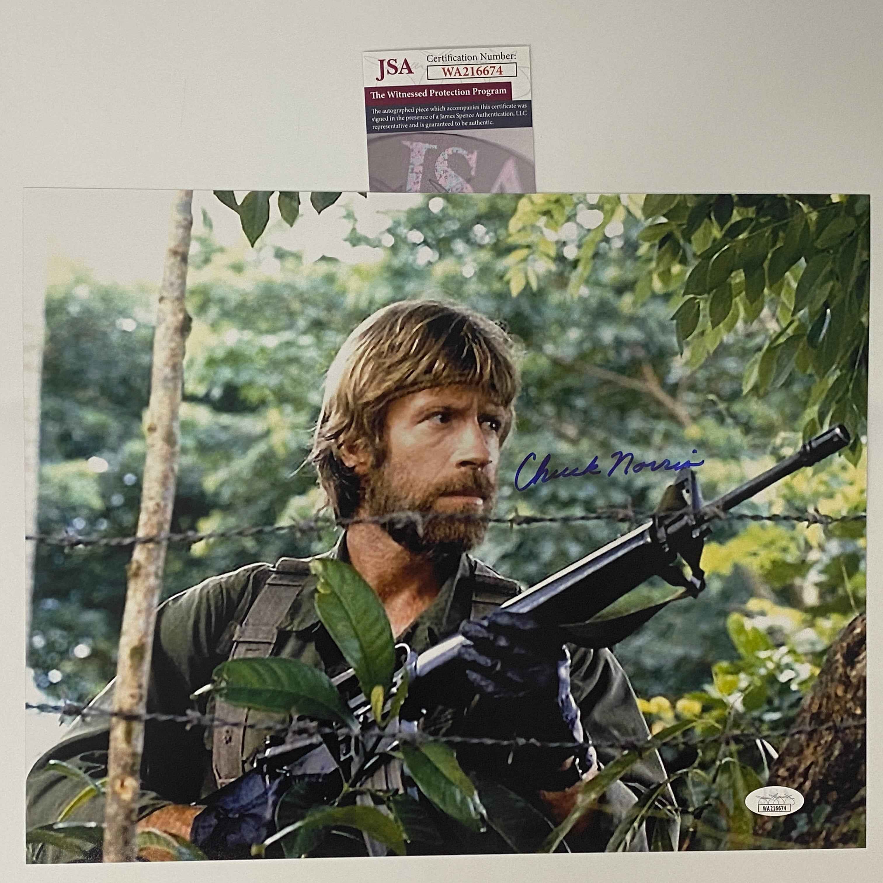 Autographed/Signed Chuck Norris Missing in Action 11x14 Movie Photo JSA COA #6