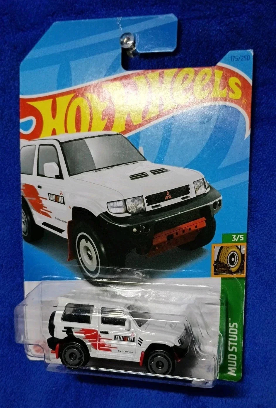 Mitsubishi Pajero Evolution Mud Studs Hot Wheels Die-Cast | Rally SUV Collector's Edition - Die-Cast Vehicle | 99RedCoins